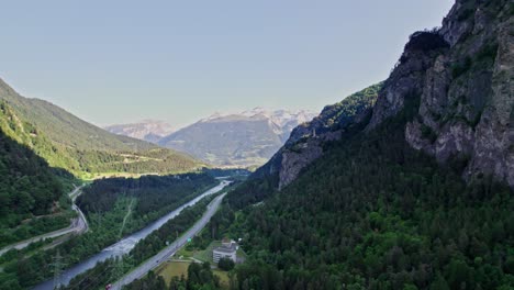 aerial view of valley in rothenbrunnen with hinterrhein river running through it