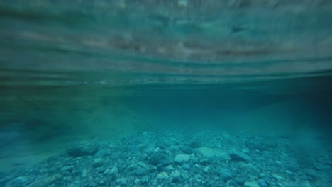 Half-underwater-view-of-beautiful-mountain-river