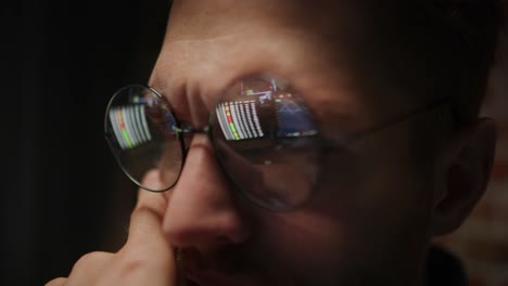 close up of man working on computer