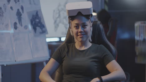 woman wearing vr headset in a creative workspace