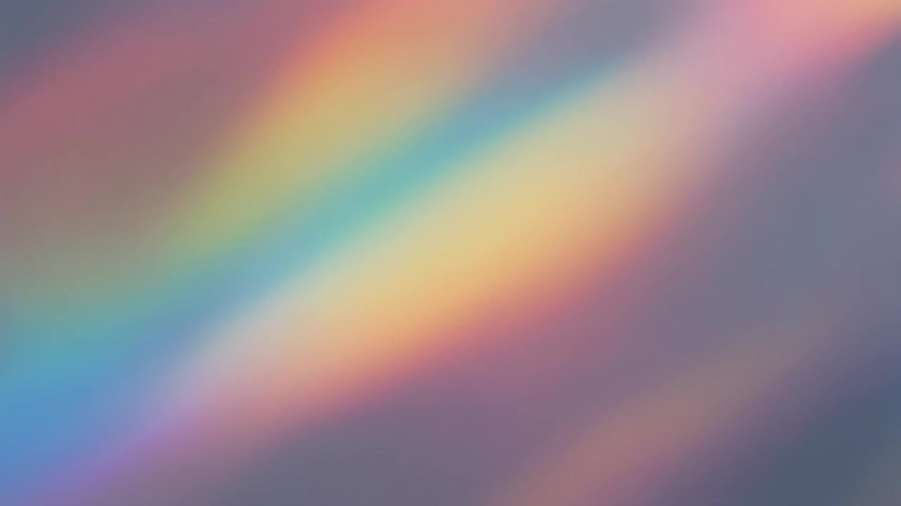 Abstract Rainbow Light Leaks Moving Across a Soft Grey Background