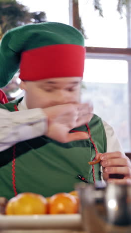 elf eating at table. vertical video