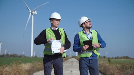 wind farm engineers reviewing plans