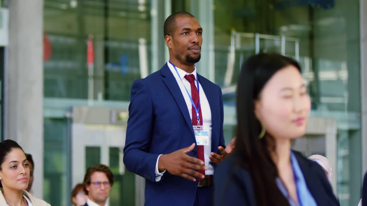 Businessman asking a question in a business seminar 4k