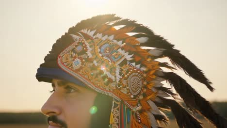 man wearing a native american headdress