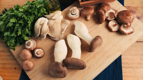 assortment of fresh mushrooms and parsley