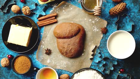 gingerbread dough placed among various ingredients  christmas baking concept