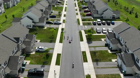 a drone flies over homes in suburban housing development