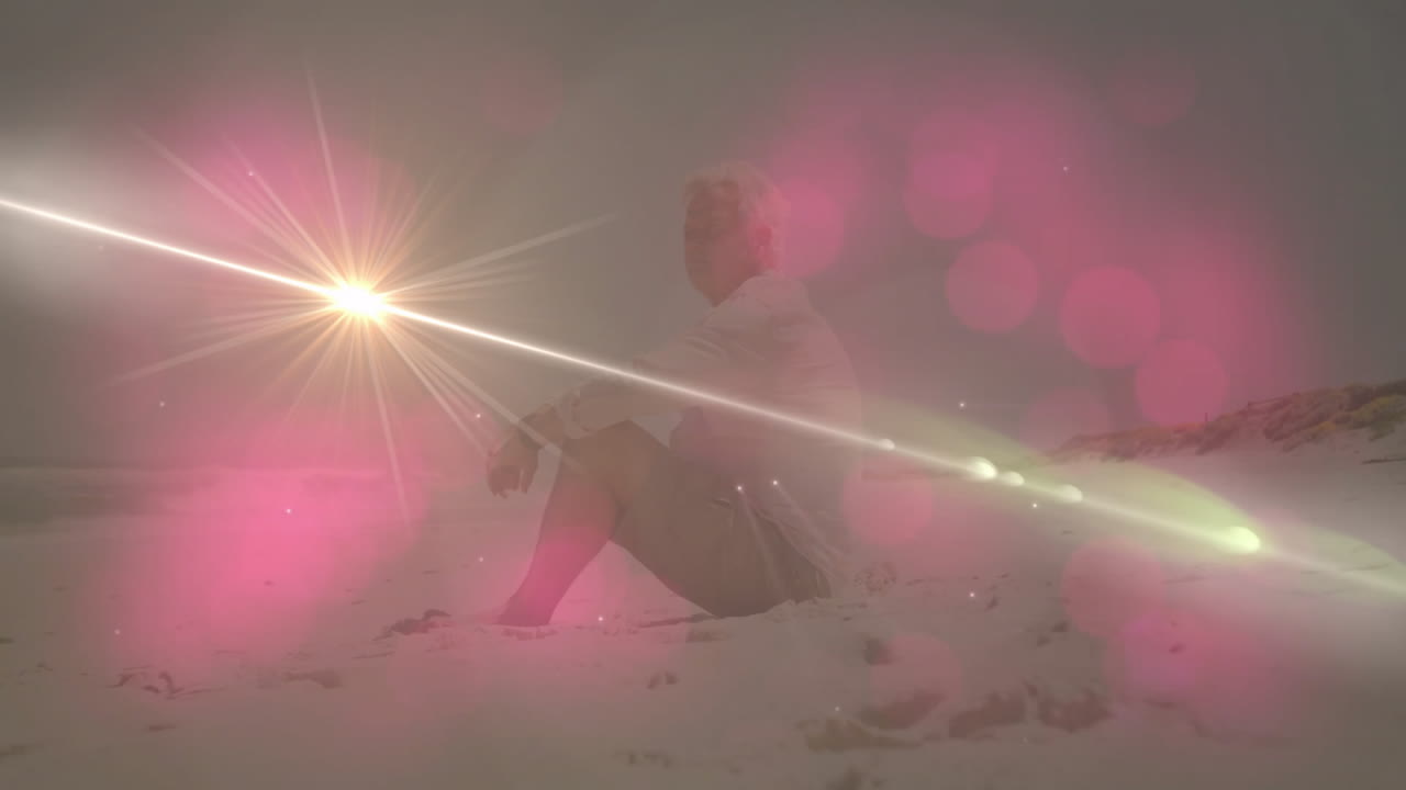 Senior man kneeling on sandy beach at sunrise, showing health theme with animated sun icon