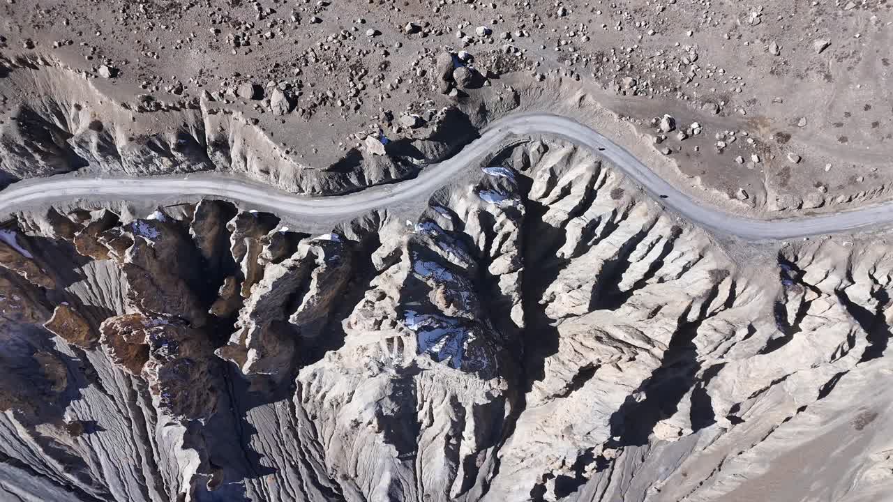 Aerial View of a Mountain Road Through a Canyon