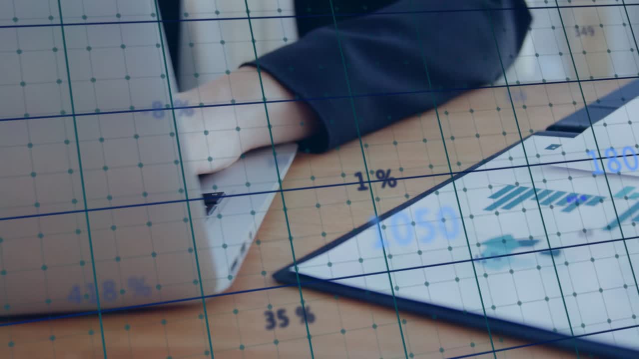 Midadult woman opening laptop lid and examining floating data grid while smiling in data analysis