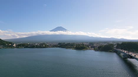 fast cinematic reveal of mount fuji behind famous kawaguchiko lake