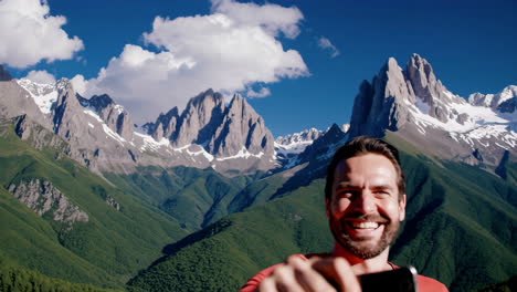 man taking a selfie in the mountains