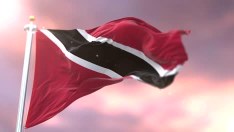 trinidad and tobago flag waving at wind in slow at sunset, loop