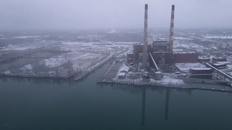 closed coal power plant on cold and moody winter day, aerial drone view