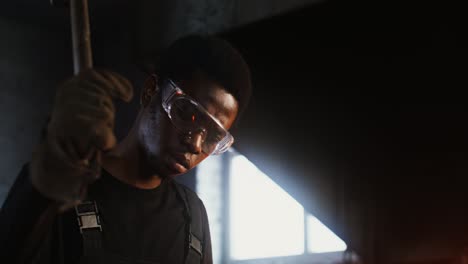 blacksmith working in a forge