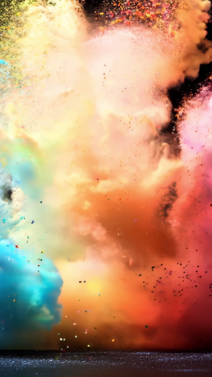 A colorful explosion of powdery dust is shown in the image. The colors are vibrant and the dust is scattered in a rainbow pattern. Scene is energetic and dynamic