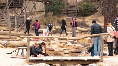 people panning for gold in historical setting