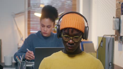 students studying together in a home office setting