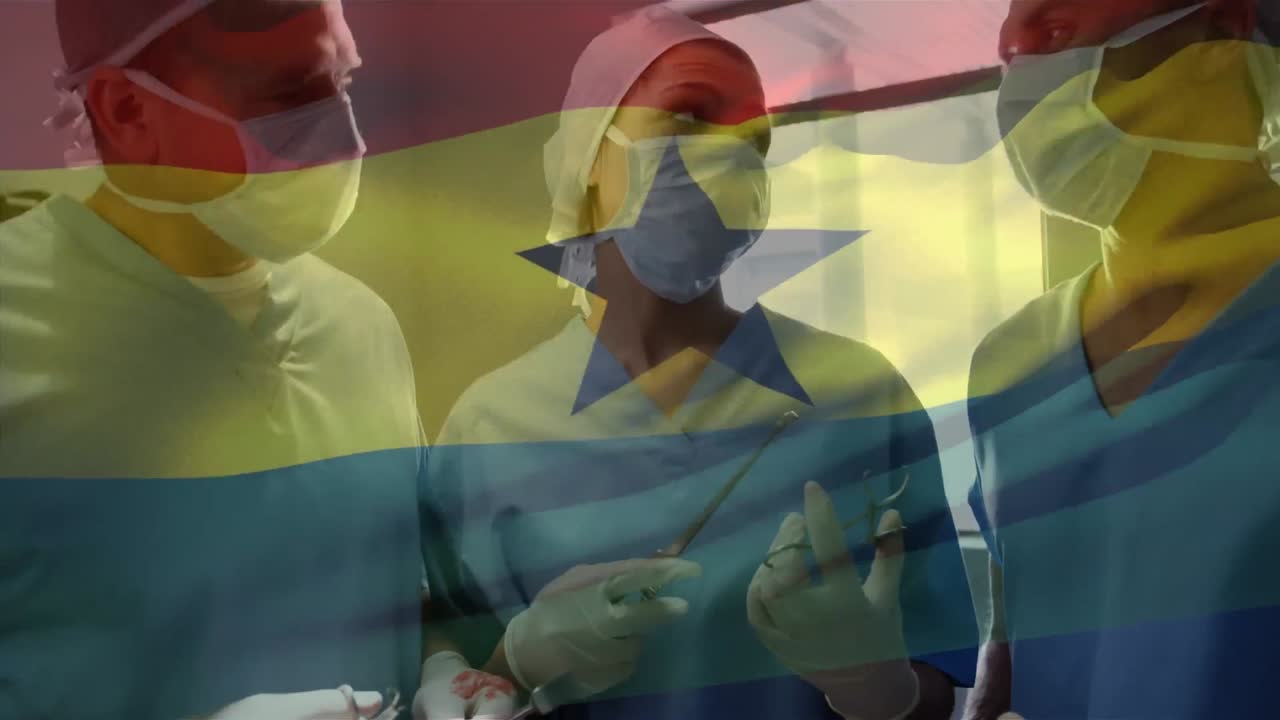Animation of flag of ghana waving over surgeons in operating theatre
