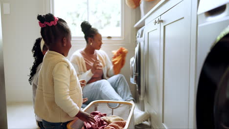 Laundry,-washing-machine-and-a-mother-in-the-home