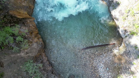 Flyover-of-Serene-Slow-Motion-Waterfall-[4K