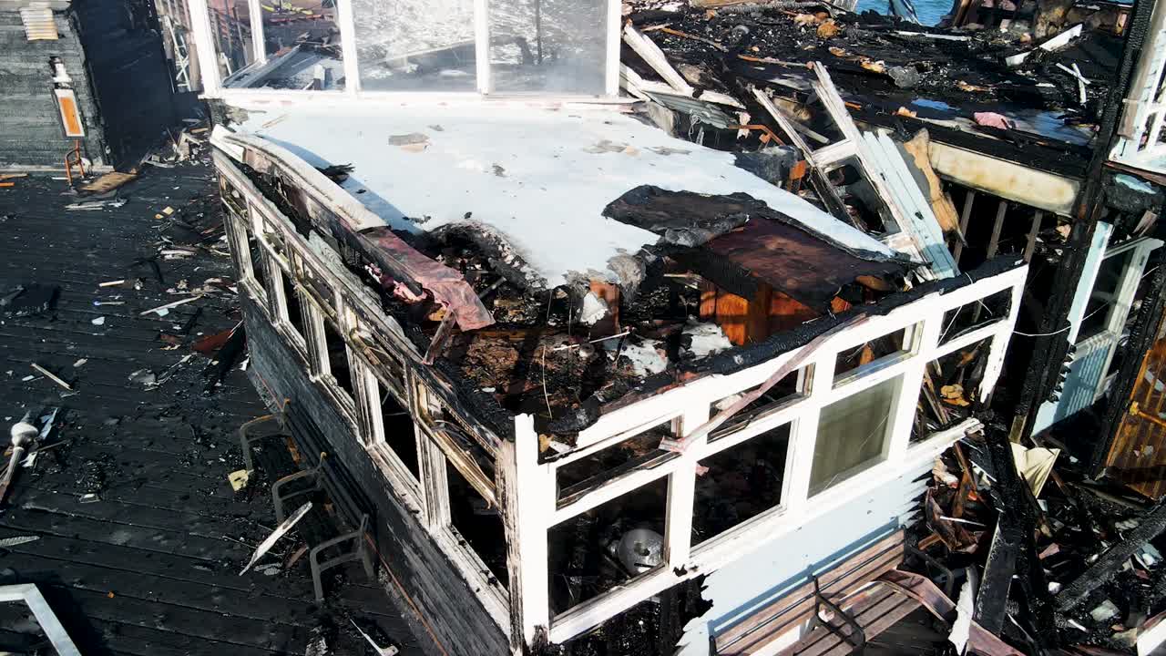 closeup of oceanside pier burned