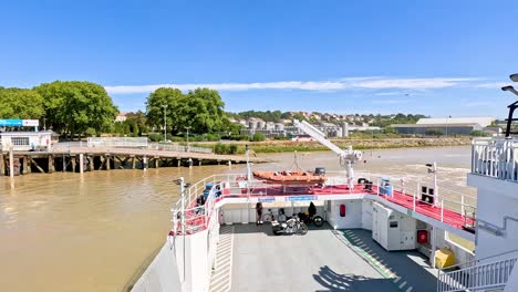 ferryboat travels across river in blaye, france