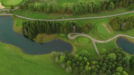 golf course with colorful pond