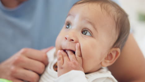 father, baby and play in home with toys
