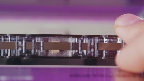 close-up view of an audio cassette player and tape