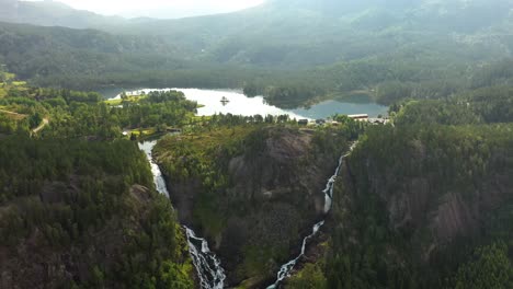 Latefossen-is-one-of-the-most-visited-waterfalls-in-Norway-and-is-located-near-Skare-and-Odda-in-the-region-Hordaland,-Norway.-Consists-of-two-separate-streams-flowing-down-from-the-lake-Lotevatnet.