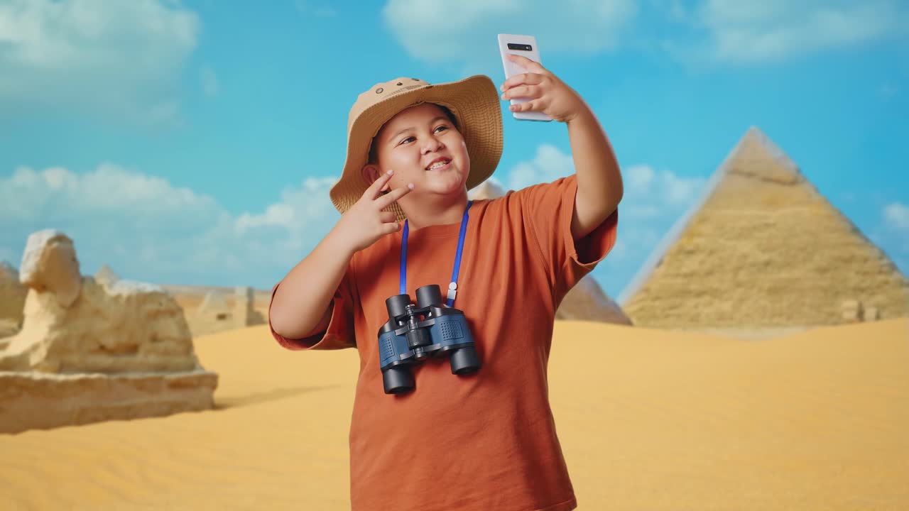 Child Taking Selfie near Pyramids in Egypt