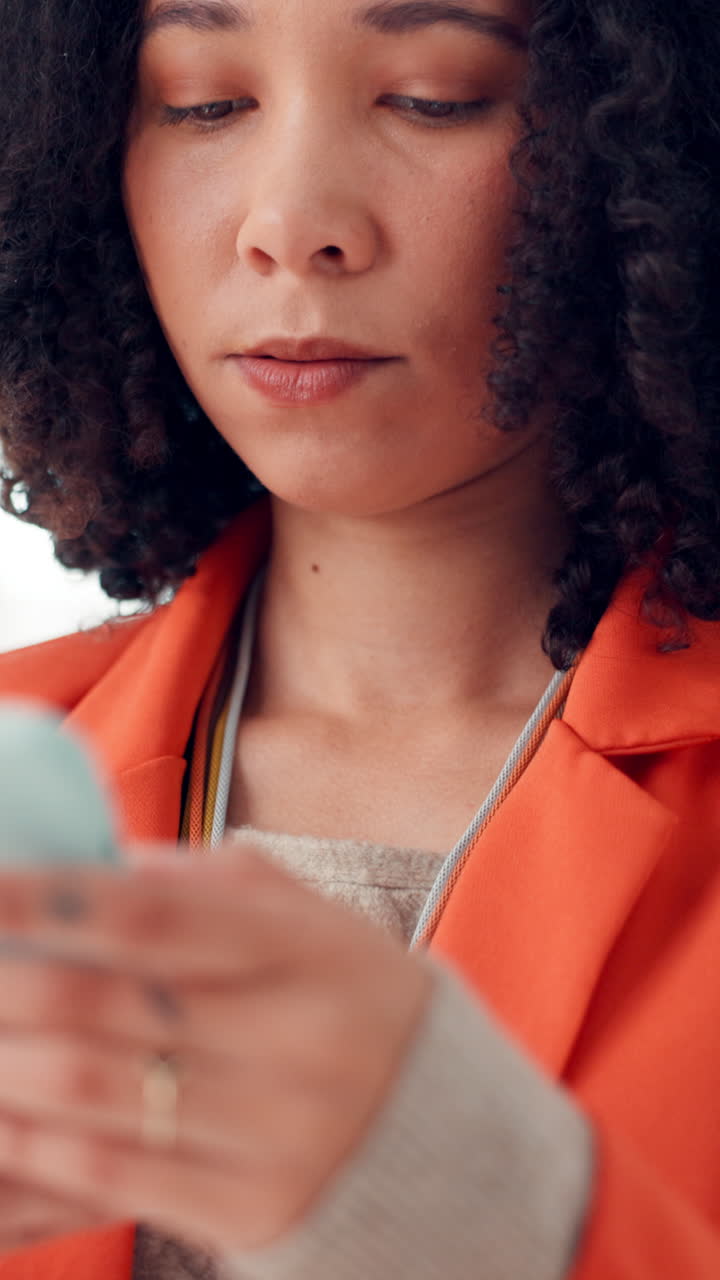 Young Woman Using Smartphone with Focused Expression