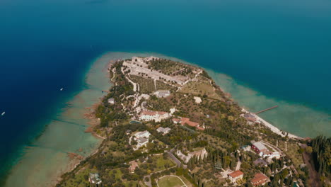 drone shot over sirmione city, garda lake italy