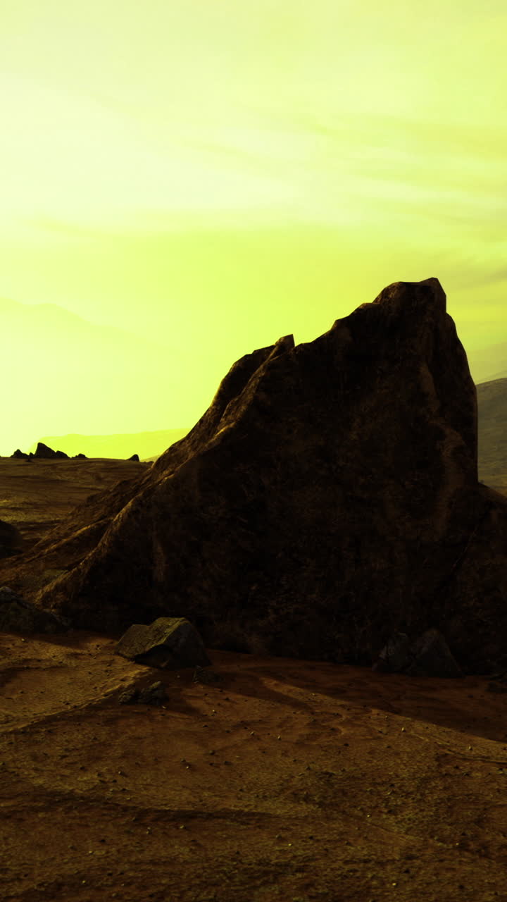 Golden hues fill the air as the sun sets behind distant mountains