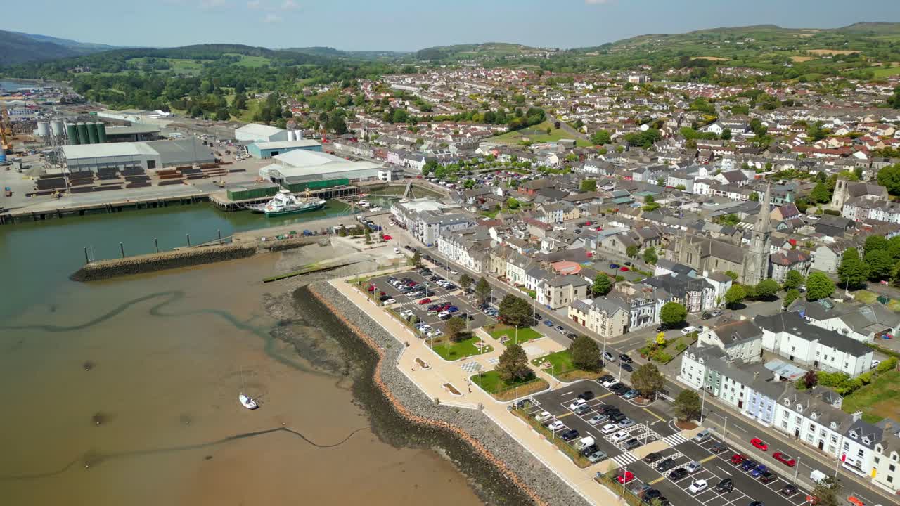 Forward travelling aerial video of Warrenpoint, County Down, Northern Ireland, UK on a bright and sunny day. Filmed in 4K, 60FPS and with Rec709 color.