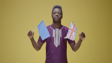 man holding european union flag with varying expressions