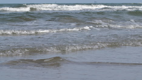 ocean waves on the beach, slow motion