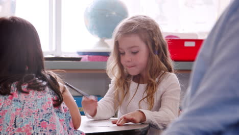 Elementary-school-schoolgirl-drawing-in-art-class