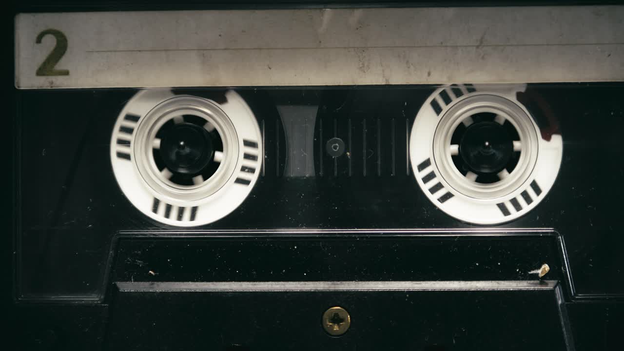 Retro Home entertainment cassette tape recorder playing CLOSE-UP Top Down