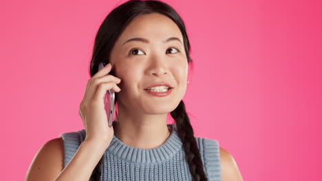 Asian-woman,-face-or-phone-call-isolated-in-studio