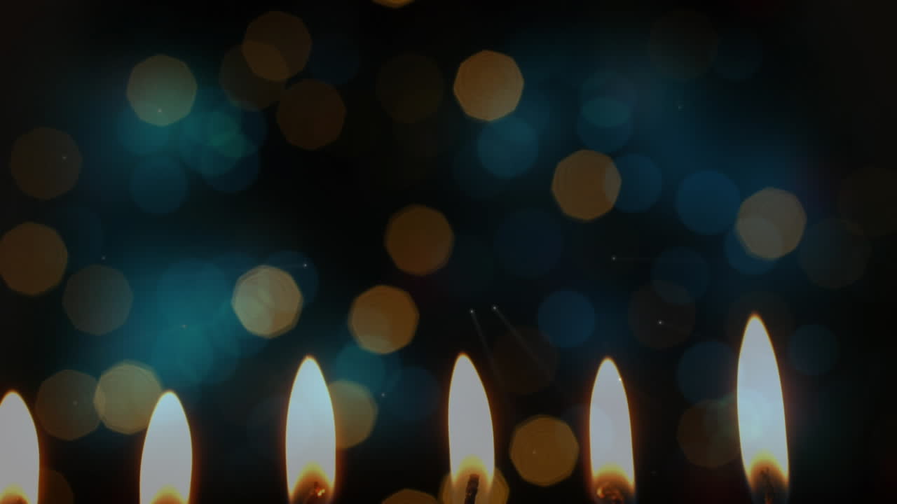 animación de velas encendidas con puntos de luz parpadeantes