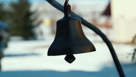 small bell ringing at winter time