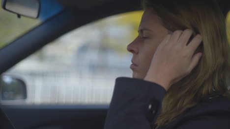 Sad-woman-steps-in-her-car-and-overthinks-a-dire-situation