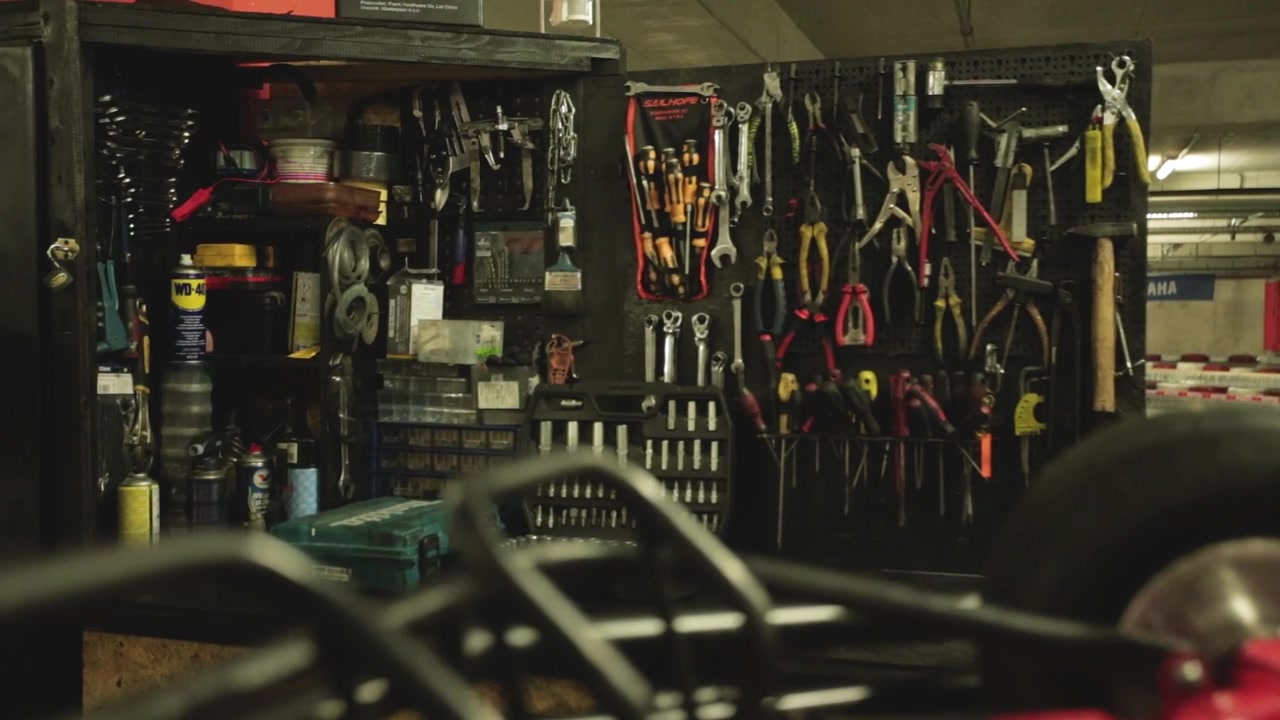 go kart repair station, focus in - out