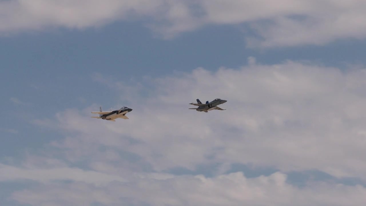 Fighter jets fly low and slow in formation