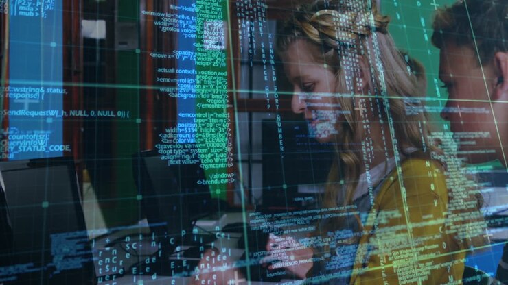 Elaborazione dati con linee a griglia sovrapposte sullo sfondo di uno studente e una studentessa che usano un computer