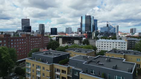 low rooftop flyover: cityscape skyline of estonia capital city tallinn