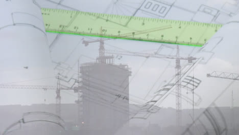 planos de construcción y un gobernante